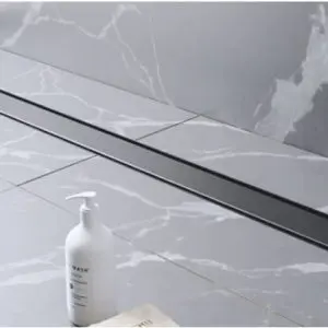 Kit para plato de obra con sumidero Ruber Reducido con sifón de 30 mm y rejilla EVOLUX LISA DARK 60 x 7 cm Reducido - EVOLUX -IE51000R - Estil Gurú